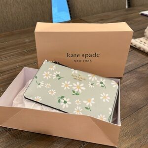Kate spade wallet clutch.  Perfect spring colors!  Brand new with tag and box